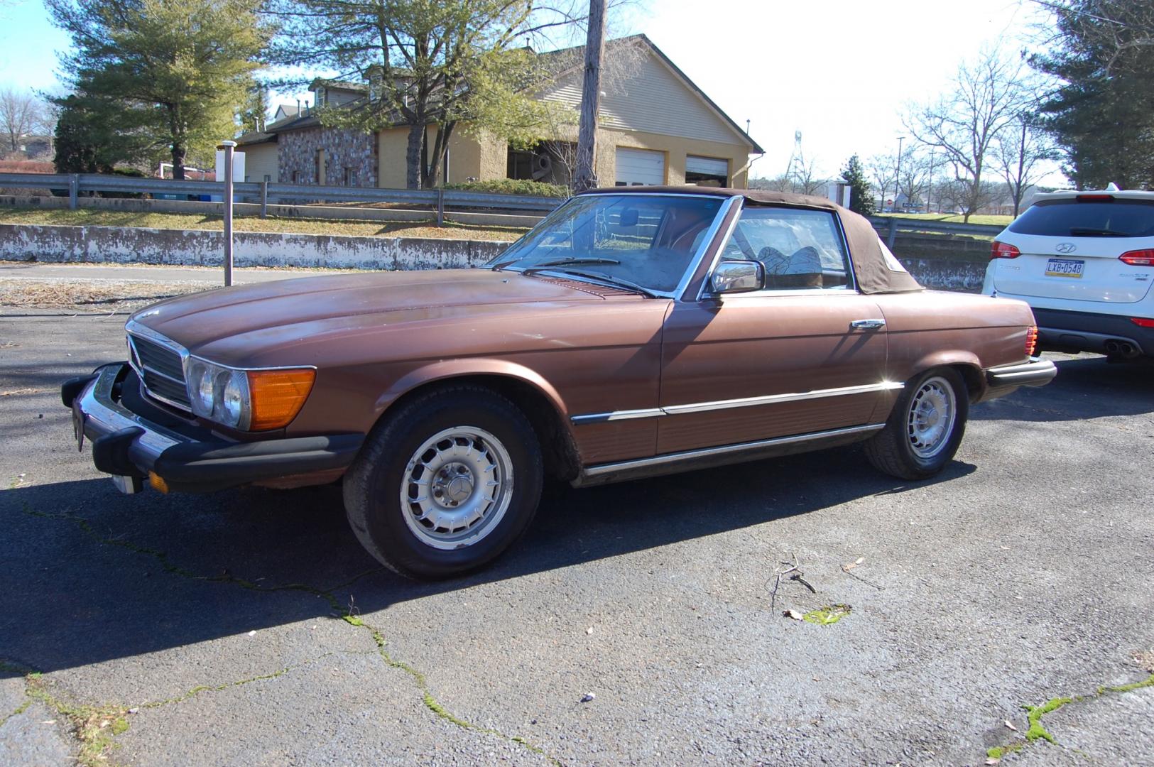 1976 Brown /Brown Leather Mercedes-Benz 450SL (10704412030) with an 4.5L V8 engine, Automatic transmission, located at 6528 Lower York Road, New Hope, PA, 18938, (215) 862-9555, 40.358707, -74.977882 - Here we have a nice 1976 Mercedes 450SL convertible with a 4.5L V8 engine putting power to the rear wheels via an automatic transmission. Some options on this vehicle include brown leather, wood trim, power windows, removable hard top, heat, A/C, AM/FM radio, cruise control, wood steering wheel, 14 - Photo#0